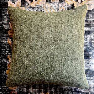 Green boucle pillow